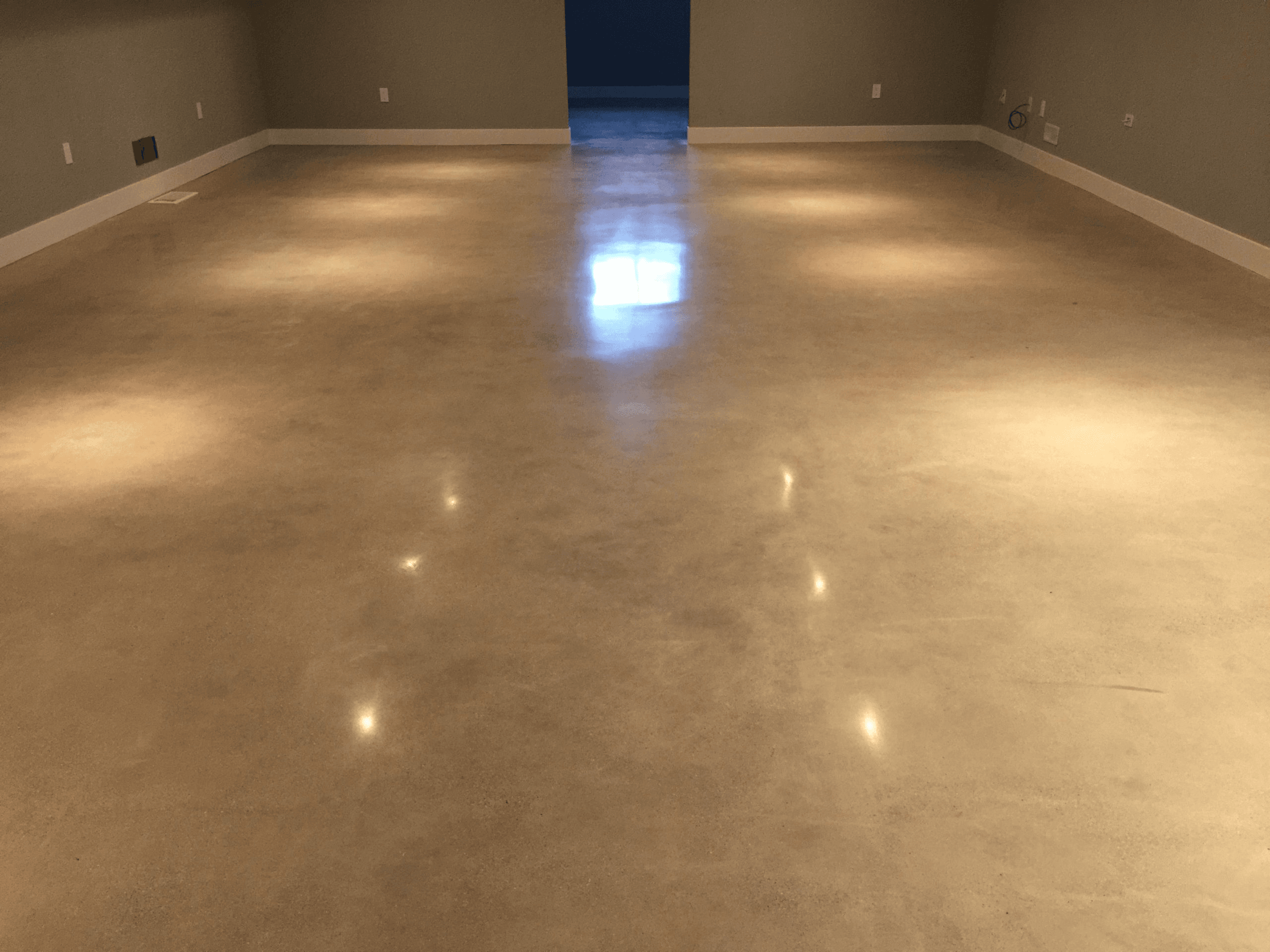 Epoxy floor coating applied in a residential basement in London, Ontario