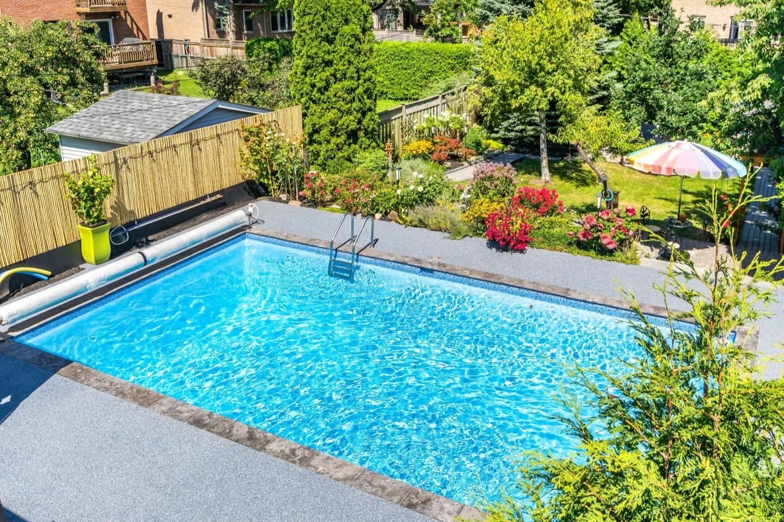 Soft Rubberkrete resurfacing applied around an inground pool
