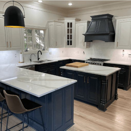 Kitchen cabinets refinished and painted dark blue by Forest City Painters in London, Ontario